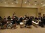 Tea Party members listen to speakers before deciding who to vote for in a Cedar Falls straw poll.